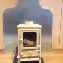 Backplate installed and slate stove base in place