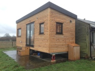 Cabin installed in new home experiences its first rainfall